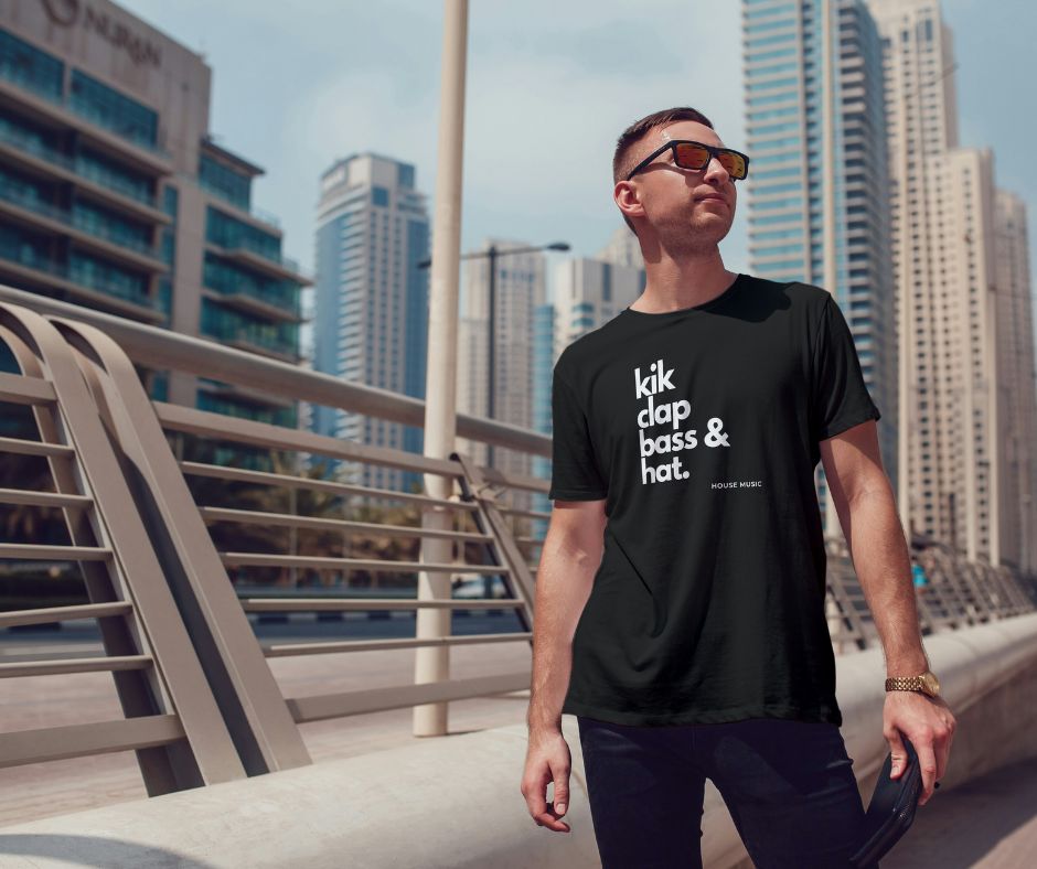 andy rray t shirt saying kik clap bass and hat